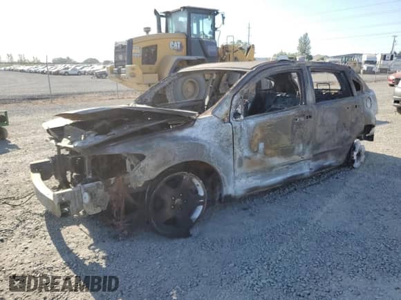 2007 Dodge Caliber SXT with VIN 1B3HB48B97D592514, listed as a Copart auction lot 66402585 with Not provided miles and Salvage title. Bid and sale history available at DreamBid. Image 1.