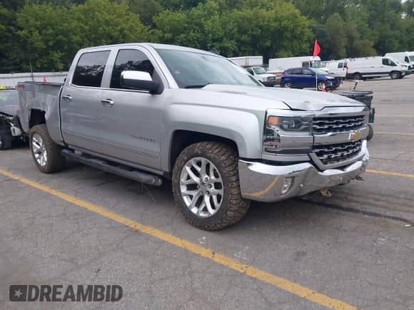 2018 Chevrolet Silverado 1500 LTZ with VIN 3GCUKSECXJG414586, listed as a IAAI auction lot 43103024 with 255,924 mi miles and . Bid and sale history available at DreamBid. Image 1.