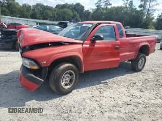 2000 Dodge Dakota Sport with VIN 1B7GG22N7YS710849, listed as a Copart auction lot 71398895 with Not provided miles and Salvage title. Bid and sale history available at DreamBid. Image 1.