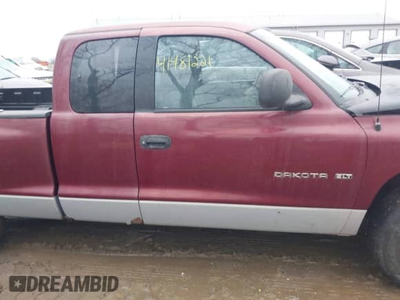 2000 Dodge Dakota Sport with VIN 1B7GL22N9YS577541, listed as a IAAI auction lot 41481221 with 148,815 mi miles and . Bid and sale history available at DreamBid. Image 13.