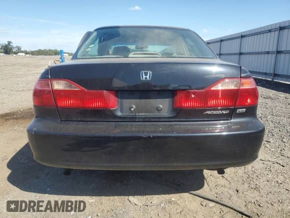 1998 Honda Accord EX with VIN 1HGCG1657WA030196, listed as a Copart auction lot 85301735 with 148,472 mi miles and Salvage title. Bid and sale history available at DreamBid. Image 6.