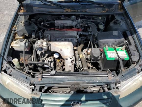 1999 Toyota Camry LE z VIN 4T1BG22K7XU443923, wystawiony jako Copart lot #61206005 z przebiegiem 265 239 mil mil oraz Czysty tytuł • Clean title. Historia ofert i sprzedaży dostępna na DreamBid. Obrazek 11.