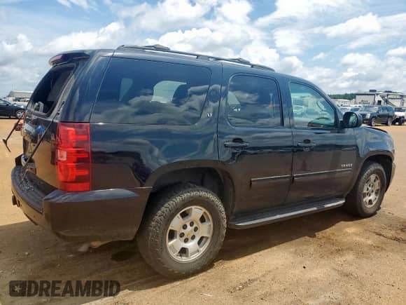 2014 Chevrolet Tahoe LT with VIN 1GNSCBE0XER118569, listed as a Copart auction lot 64116525 with 162,561 mi miles and Salvage title. Bid and sale history available at DreamBid. Image 3.