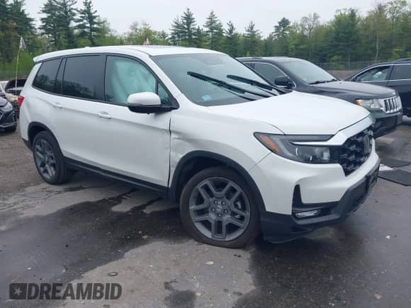 2023 Honda Passport EX-L with VIN 5FNYF8H5XPB005136, listed as a IAAI auction lot 42275156 with 35,471 mi miles and . Bid and sale history available at DreamBid. Image 6.