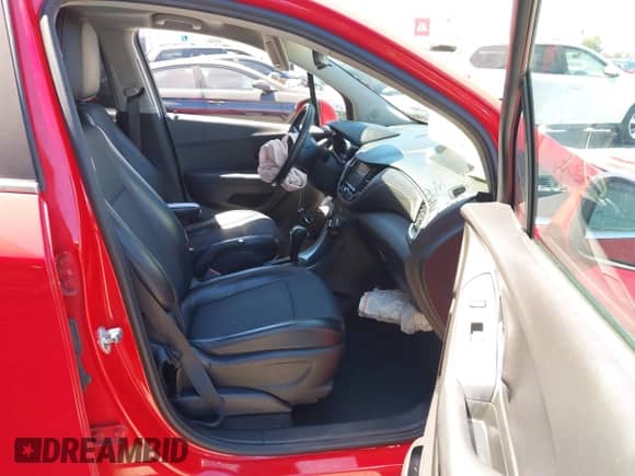 2018 Chevrolet Trax LT z VIN 3GNCJLSB7JL166523, wystawiony jako IAAI lot #42871276 z przebiegiem 132 070 mil mil oraz . Historia ofert i sprzedaży dostępna na DreamBid. Obrazek 5.
