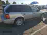 1997 Saturn SW with VIN 1G8ZK8279VZ169005, listed as a Copart auction lot 73049694 with 110,215 mi miles and Salvage title. Bid and sale history available at DreamBid. Image 3.