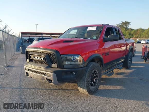 2018 Ram 1500 Rebel with VIN 1C6RR7YT8JS178952, listed as a IAAI auction lot 40514135 with 122,955 mi miles and . Bid and sale history available at DreamBid. Image 17.