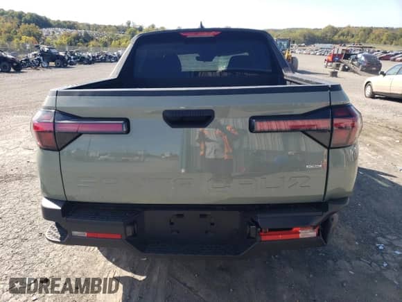 2022 Hyundai Santa Cruz SEL with VIN 5NTJBDAE3NH031299, listed as a Copart auction lot 71190173 with 14,417 mi miles and Salvage title. Bid and sale history available at DreamBid. Image 6.