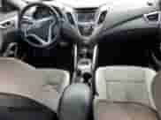 2014 Hyundai Veloster z VIN KMHTC6AD0EU196106, wystawiony jako Copart lot #69494305 z przebiegiem 102 472 mil mil oraz Szkoda całkowita • Salvage title. Historia ofert i sprzedaży dostępna na DreamBid. Obrazek 8.