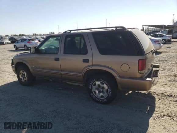 2004 Chevrolet Blazer LS with VIN 1GNDT13XX4K158824, listed as a Copart auction lot 66380055 with 80,675 mi miles and Salvage title. Bid and sale history available at DreamBid. Image 2.