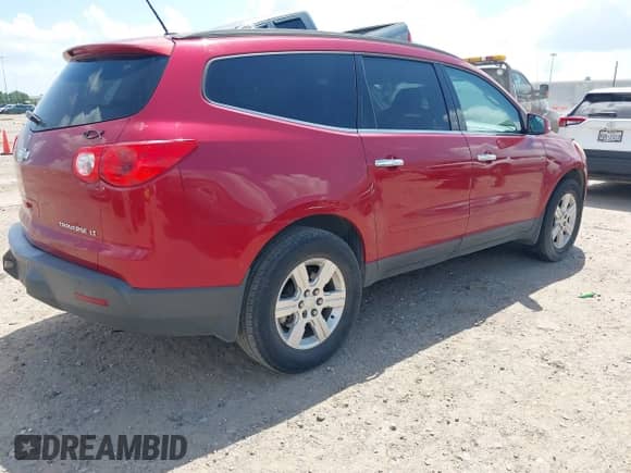 2012 Chevrolet Traverse 1LT z VIN 1GNKRGED8CJ374347, wystawiony jako IAAI lot #43049360 z przebiegiem Nie podano mil oraz . Historia ofert i sprzedaży dostępna na DreamBid. Obrazek 4.