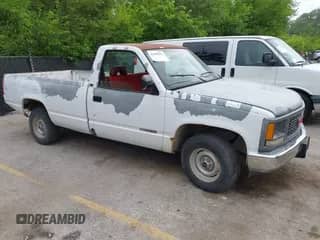 1994 GMC Sierra 1500 z VIN 1GTEC14ZXRZ521487, wystawiony jako IAAI lot #42499392 z przebiegiem 249 618 mil mil oraz . Historia ofert i sprzedaży dostępna na DreamBid. Obrazek 1.