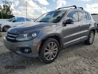 2012 Volkswagen Tiguan S с VIN WVGAV7AX4CW000140, выставлен на аукционе Copart как лот 80901355 с пробегом 133 056 миль миль и Списание • Salvage title. История ставок и продаж доступна на DreamBid. Изображение 1.