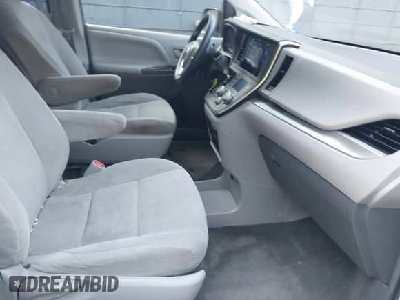 2015 Toyota Sienna L with VIN 5TDZK3DCXFS614096, listed as a IAAI auction lot 39977158 with 93,471 mi miles and . Bid and sale history available at DreamBid. Image 5.