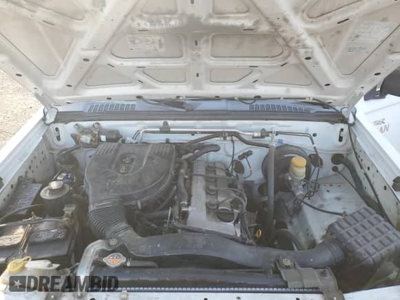 1998 Nissan Frontier XE с VIN 1N6DD21SXWC366246, выставлен на аукционе Copart как лот 67872835 с пробегом 162 318 миль миль и Чистый • Clean title. История ставок и продаж доступна на DreamBid. Изображение 11.