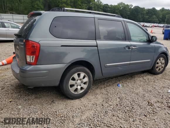 2007 Hyundai Entourage GLS with VIN KNDMC233376023404, listed as a Copart auction lot 69413625 with 135,989 mi miles and Salvage title. Bid and sale history available at DreamBid. Image 3.