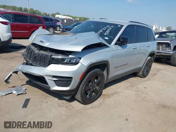 2023 Jeep Grand Cherokee Laredo with VIN 1C4RJHAG5PC659828, listed as a IAAI auction lot 43418211 with 27,942 mi miles and . Bid and sale history available at DreamBid. Image 16.