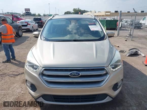 2017 Ford Escape Titanium with VIN 1FMCU9J9XHUD90656, listed as a IAAI auction lot 43216695 with 109,897 mi miles and . Bid and sale history available at DreamBid. Image 12.