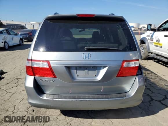 2007 Honda Odyssey EX-L с VIN 5FNRL38767B121645, выставлен на аукционе Copart как лот 87224365 с пробегом 167 747 миль миль и Списание • Salvage title. История ставок и продаж доступна на DreamBid. Изображение 6.