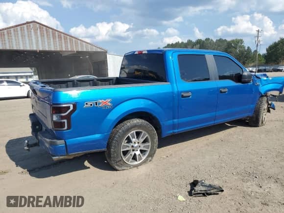2019 Ford F-150 XL with VIN 1FTEW1E50KFA31859, listed as a Copart auction lot 69887245 with Not provided miles and Salvage title. Bid and sale history available at DreamBid. Image 3.