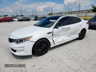 2016 Kia Optima EX with VIN 5XXGU4L30GG054701, listed as a Copart auction lot 70198325 with 122,302 mi miles and Salvage title. Bid and sale history available at DreamBid. Image 1.
