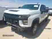 2021 Chevrolet Silverado 2500HD Work Truck with VIN 1GC1YLE70MF129976, listed as a IAAI auction lot 43066452 with 119,803 mi miles and . Bid and sale history available at DreamBid. Image 2.