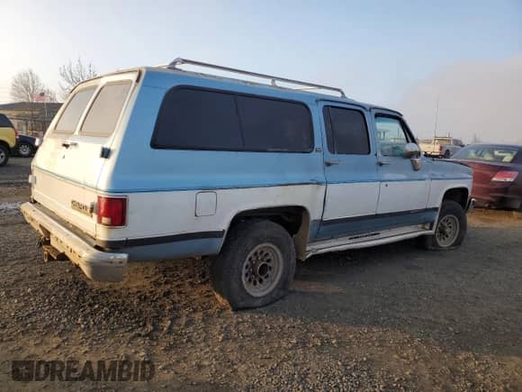 1990 Chevrolet Suburban с VIN 1GNGV26K8LF160480, выставлен на аукционе Copart как лот 83665974 с пробегом 246 841 миль миль и Чистый • Clean title. История ставок и продаж доступна на DreamBid. Изображение 3.