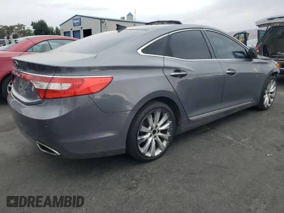 2012 Hyundai Azera с VIN KMHFH4JG6CA190810, выставлен на аукционе Copart как лот 81902675 с пробегом 204 579 миль миль и Списание • Salvage title. История ставок и продаж доступна на DreamBid. Изображение 3.