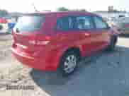 2013 Dodge Journey SE with VIN 3C4PDCAB4DT675542, listed as a IAAI auction lot 42393737 with 134,051 mi miles and . Bid and sale history available at DreamBid. Image 4.