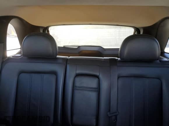 2012 Chevrolet Captiva Sport LTZ z VIN 3GNFL4E56CS594174, wystawiony jako Copart lot #74492554 z przebiegiem 129 625 mil mil oraz Czysty tytuł • Clean title. Historia ofert i sprzedaży dostępna na DreamBid. Obrazek 10.