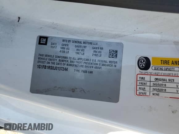 2018 Chevrolet Camaro 1LT z VIN 1G1FB1RS8J0137244, wystawiony jako Copart lot #68961385 z przebiegiem 107 015 mil mil oraz Szkoda całkowita • Salvage title. Historia ofert i sprzedaży dostępna na DreamBid. Obrazek 12.
