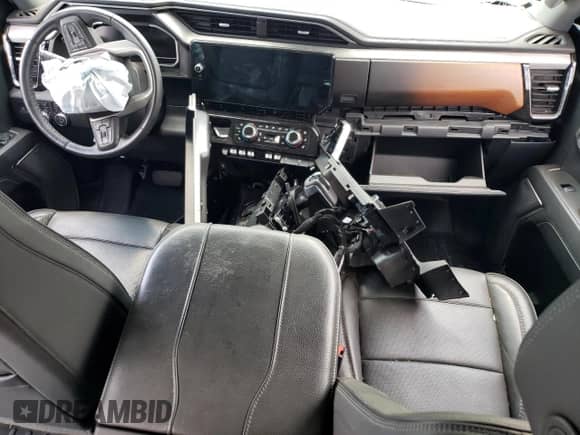 2023 GMC Sierra 1500 Denali с VIN 3GTUUGE85PG150446, выставлен на аукционе Copart как лот 68747954 с пробегом 27 929 миль миль и Списание • Salvage title. История ставок и продаж доступна на DreamBid. Изображение 8.