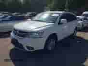 2013 Dodge Journey SXT with VIN 3C4PDDBGXDT547953, listed as a IAAI auction lot 43315889 with 148,494 mi miles and . Bid and sale history available at DreamBid. Image 2.