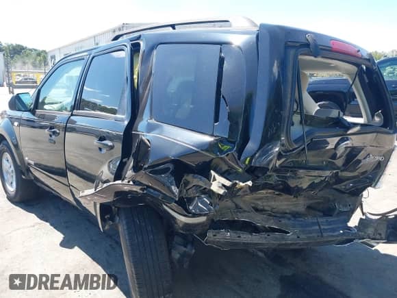 2009 Mercury Mariner Hybrid with VIN 4M2CU29359KJ17577, listed as a IAAI auction lot 43091811 with 247,830 mi miles and . Bid and sale history available at DreamBid. Image 6.