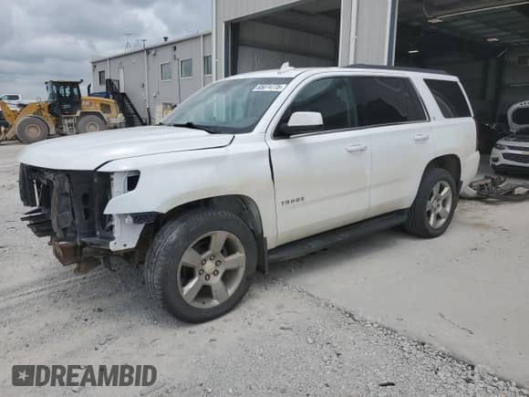 2016 Chevrolet Tahoe LT with VIN 1GNSKBKC5GR301334, listed as a Copart auction lot 65074775 with 214,289 mi miles and Salvage title. Bid and sale history available at DreamBid. Image 1.