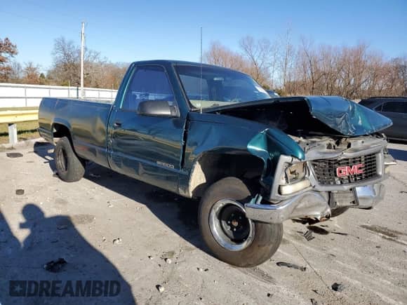 1998 GMC Sierra 1500 z VIN 1GTEC14W2WZ523039, wystawiony jako Copart lot #79906003 z przebiegiem 427 209 mil mil oraz Szkoda całkowita • Salvage title. Historia ofert i sprzedaży dostępna na DreamBid. Obrazek 4.