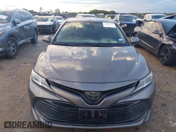 2020 Toyota Camry LE with VIN 4T1C11AK8LU400249, listed as a IAAI auction lot 43265675 with 226,398 mi miles and . Bid and sale history available at DreamBid. Image 12.