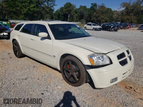 2005 Dodge Magnum RT z VIN 2D8GV58265H670143, wystawiony jako Copart lot #87054325 z przebiegiem 112 938 mil mil oraz Szkoda całkowita • Salvage title. Historia ofert i sprzedaży dostępna na DreamBid. Obrazek 4.