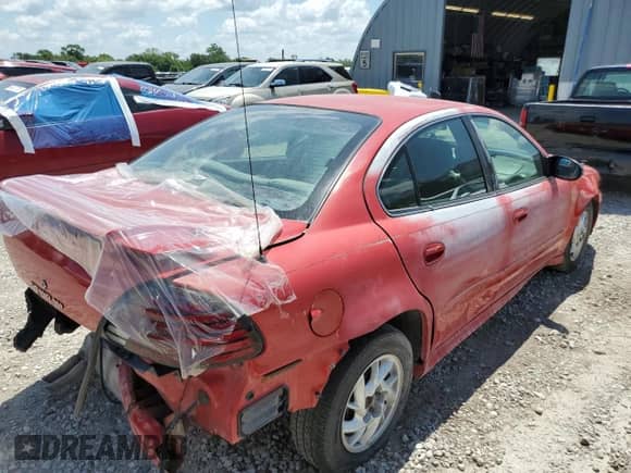 2004 Pontiac Grand Am SE1 with VIN 1G2NF52E44C208028, listed as a Copart auction lot 64062615 with 219,693 mi miles and Salvage title. Bid and sale history available at DreamBid. Image 3.
