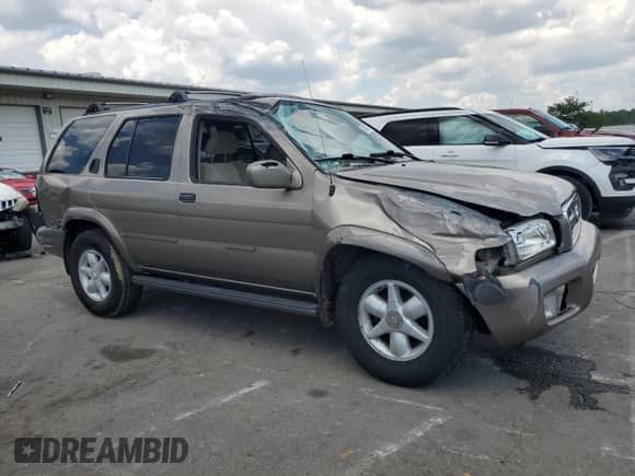 2001 Nissan Pathfinder LE with VIN JN8DR09X11W570874, listed as a Copart auction lot 63546835 with 200,612 mi miles and Salvage title. Bid and sale history available at DreamBid. Image 4.