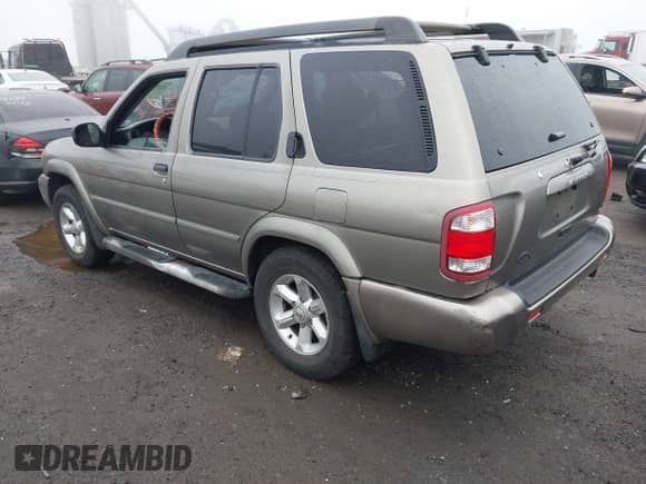 2003 Nissan Pathfinder LE z VIN JN8DR09Y13W823784, wystawiony jako IAAI lot #42498798 z przebiegiem 152 830 mil mil oraz . Historia ofert i sprzedaży dostępna na DreamBid. Obrazek 3.