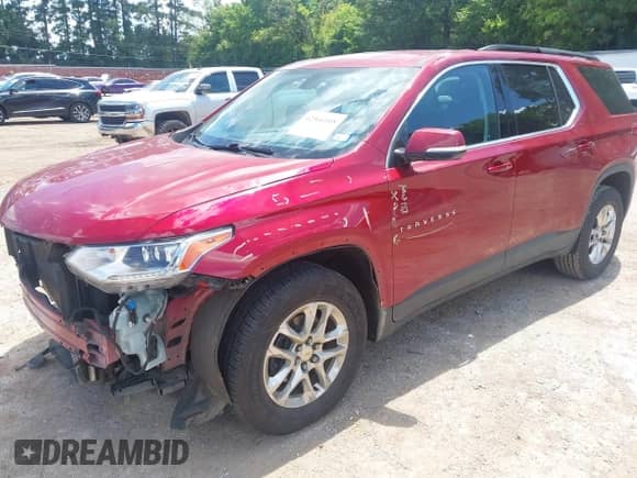 2020 Chevrolet Traverse LT with VIN 1GNERHKW6LJ296465, listed as a IAAI auction lot 42566508 with 77,678 mi miles and . Bid and sale history available at DreamBid. Image 2.