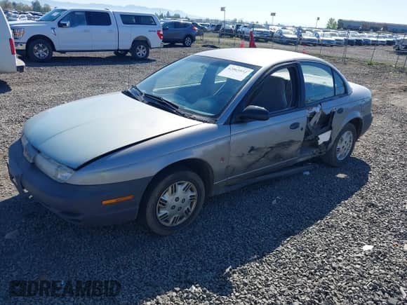1997 Saturn SL with VIN 1G8ZH5289VZ348554, listed as a IAAI auction lot 42065851 with 197,335 mi miles and . Bid and sale history available at DreamBid. Image 2.