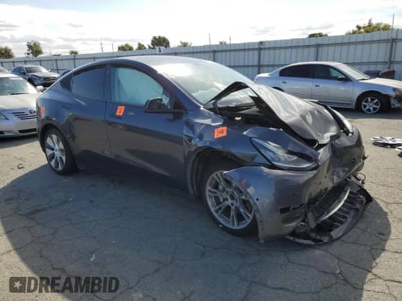 2022 Tesla Model Y Long Range with VIN 7SAYGAEE2NF345566, listed as a Copart auction lot 81694405 with Not provided miles and Salvage title. Bid and sale history available at DreamBid. Image 4.