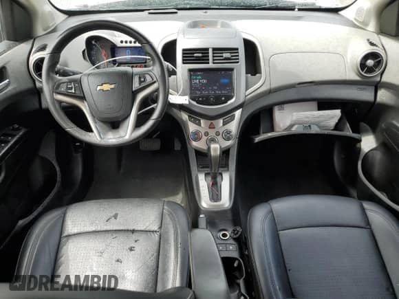2013 Chevrolet Sonic LTZ с VIN 1G1JE5SG5D4217581, выставлен на аукционе Copart как лот 55977985 с пробегом 49 601 миль миль и Списание • Salvage title. История ставок и продаж доступна на DreamBid. Изображение 8.