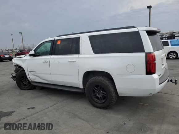 2016 Chevrolet Suburban LT с VIN 1GNSKHKCXGR248844, выставлен на аукционе Copart как лот 71046725 с пробегом 168 766 миль миль и Списание • Salvage title. История ставок и продаж доступна на DreamBid. Изображение 2.