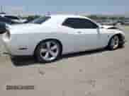 2012 Dodge Challenger SRT-8 392 с VIN 2C3CDYCJ6CH167309, выставлен на аукционе Copart как лот 64902735 с пробегом 124 180 миль миль и Списание • Salvage title. История ставок и продаж доступна на DreamBid. Изображение 3.