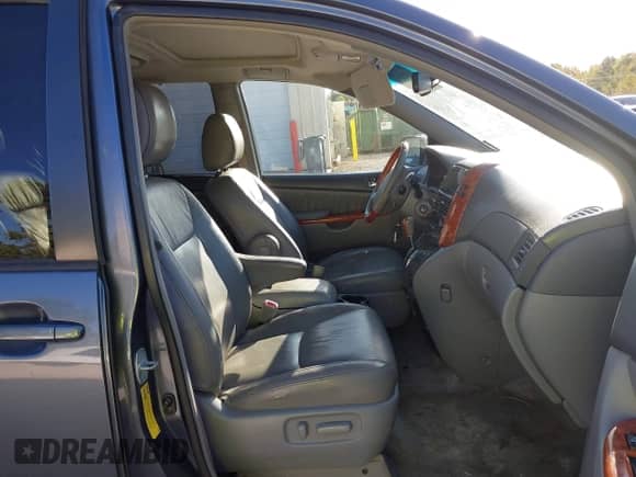 2009 Toyota Sienna XLE z VIN 5TDZK22C19S272510, wystawiony jako IAAI lot #43378731 z przebiegiem 180 183 mil mil oraz . Historia ofert i sprzedaży dostępna na DreamBid. Obrazek 5.