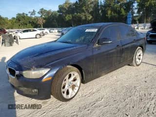 2013 BMW 3 Series 320i with VIN WBA3B1C55DF461876, listed as a Copart auction lot 81825145 with 141,034 mi miles and Clean title. Bid and sale history available at DreamBid. Image 1.