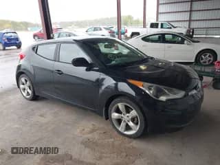 2013 Hyundai Veloster w/Black Int with VIN KMHTC6AD3DU160506, listed as a IAAI auction lot 43547188 with 174,692 mi miles and . Bid and sale history available at DreamBid. Image 1.